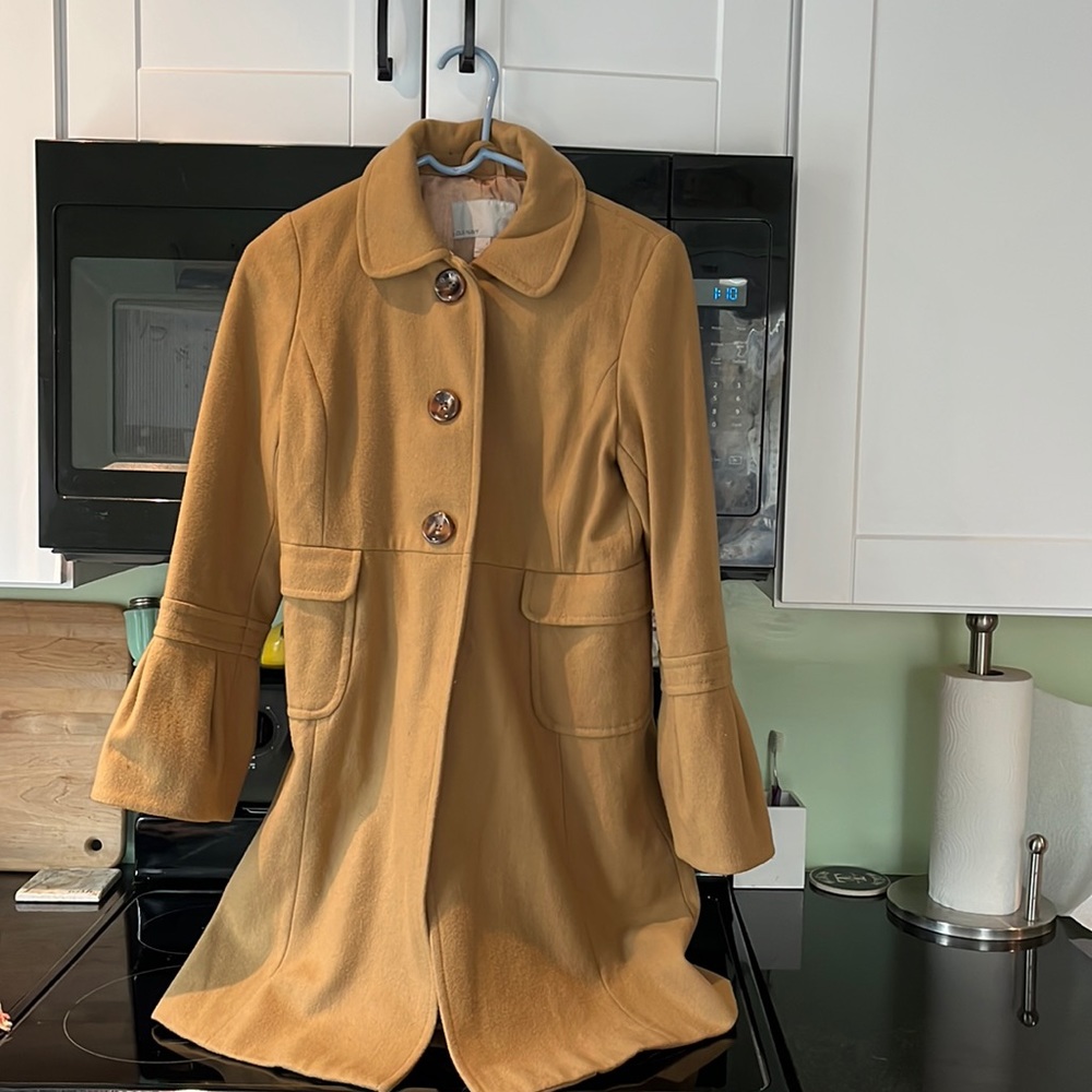Never worn, toffee color knee length, flair sleeved